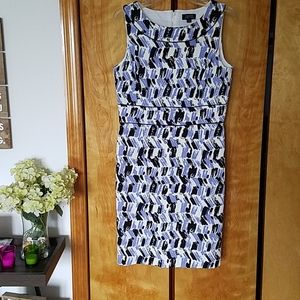 Tahari curve hugging dress.